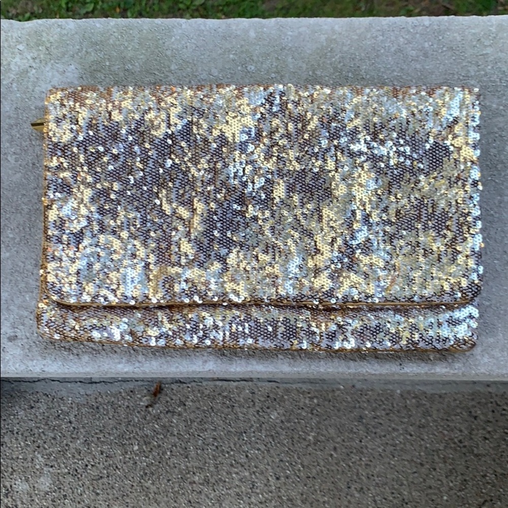 BCBG glitter clutch, magnetic closure